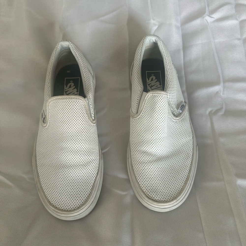 Vans Black and White Slip-On Sneakers
